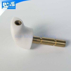 Plastic part with pipe insert
