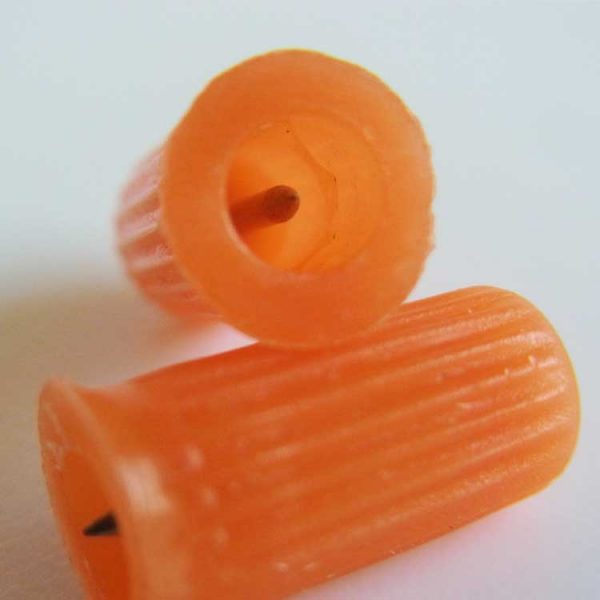 small plastic cap close view of pin