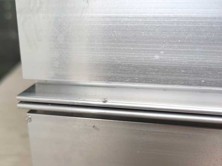 Mold marks on the raw aluminum extrusion