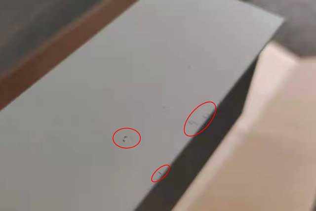 surface flaws on anodized aluminum