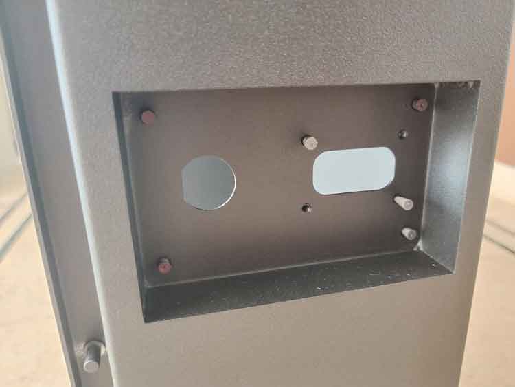 PEM rivets installed in a sheet metal cabinets backside view