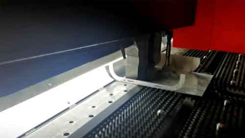 Automatic panel bender, in manufacturing