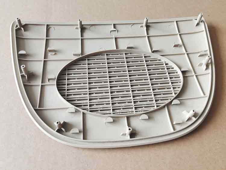Back side of PP plastic speaker cover with mesh-type structure, showing supporting ribs and structural design