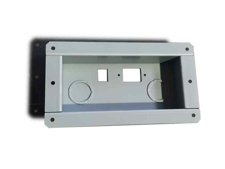 op view of a push button enclosure showing circular knockouts for switch installation