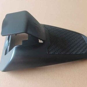 custom ABS plastic shroud with flip-open hinged cover open, Greek key/meander textured surface, and molded child-seat anchor icon.